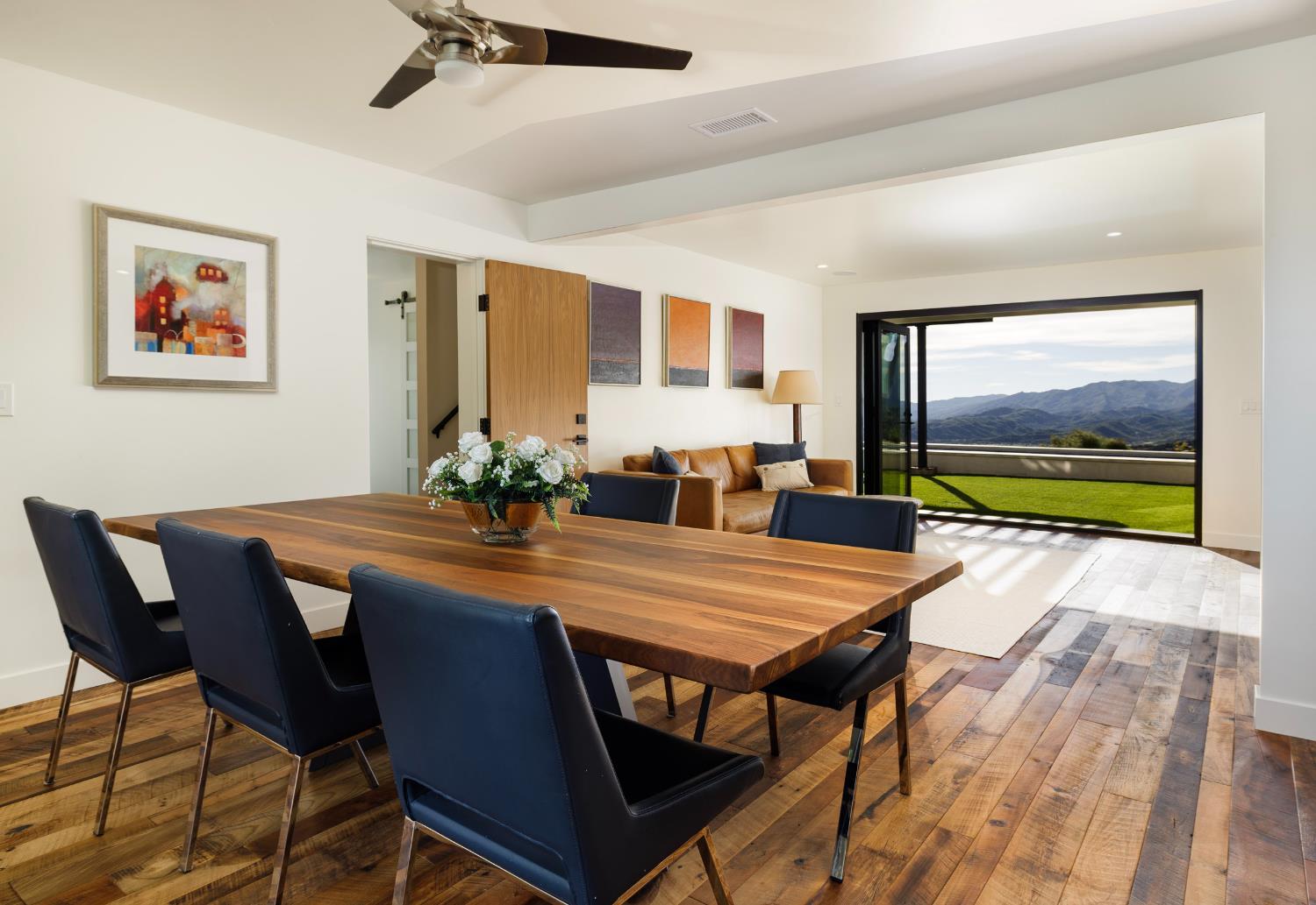 1417 Foothill Road Ojai, CA 93023 - Photo 13 of 41 a view of a dining room with furniture window and wooden floor