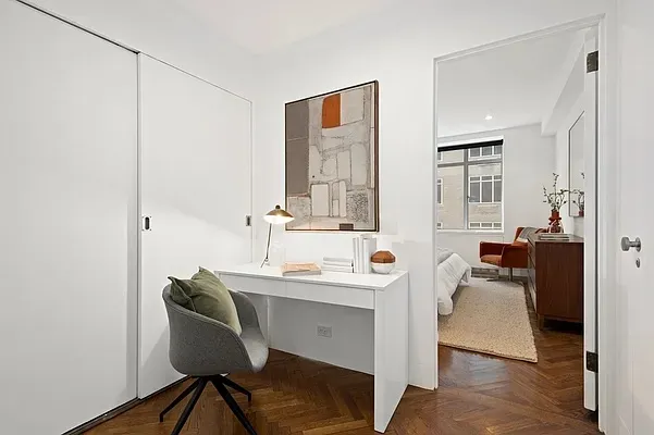 a kitchen with granite countertop a stove and a refrigerator