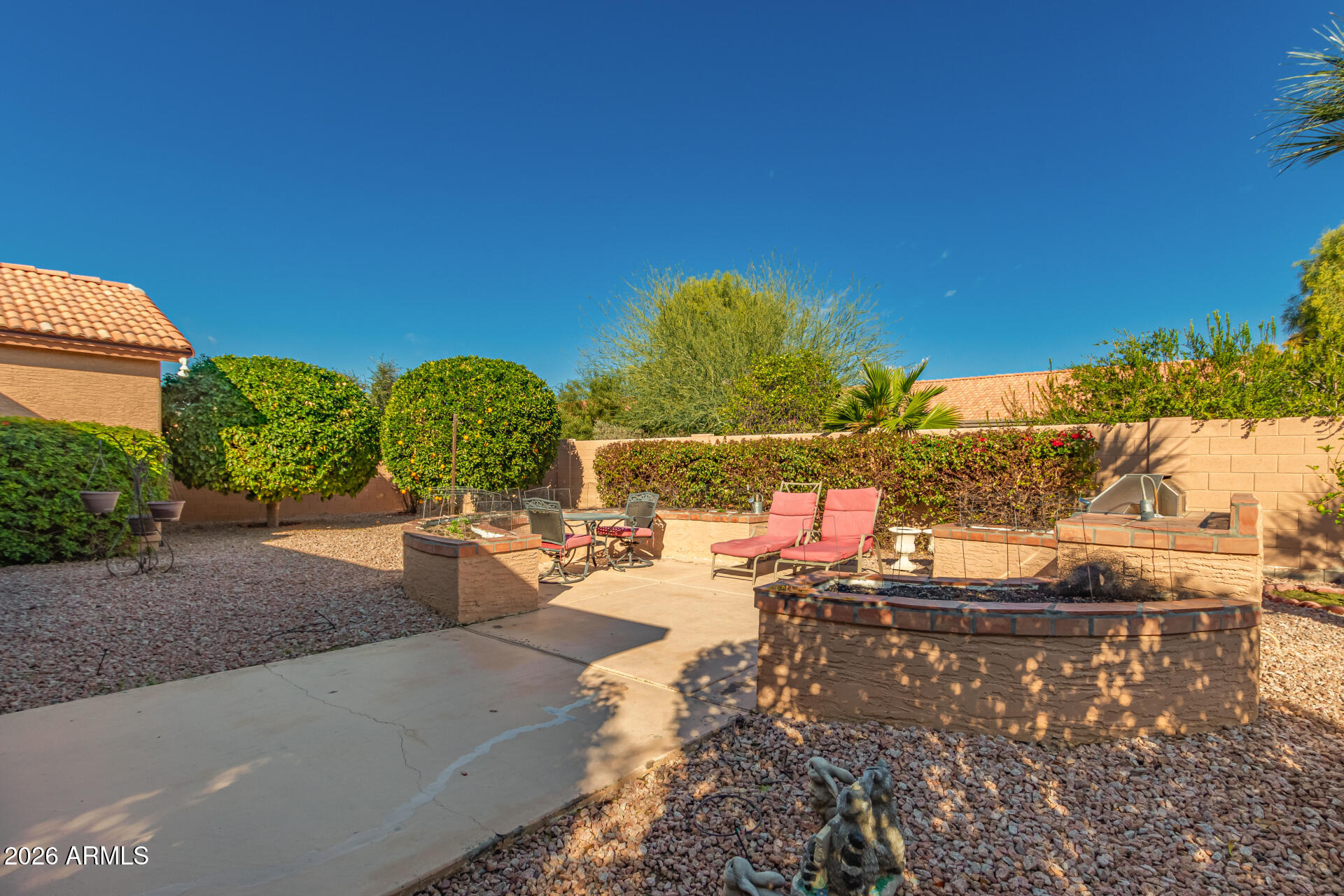 10904 East Spring Creek Road Sun Lakes, AZ 85248 - Photo 33 of 37 a view of a swimming pool with an outdoor seating