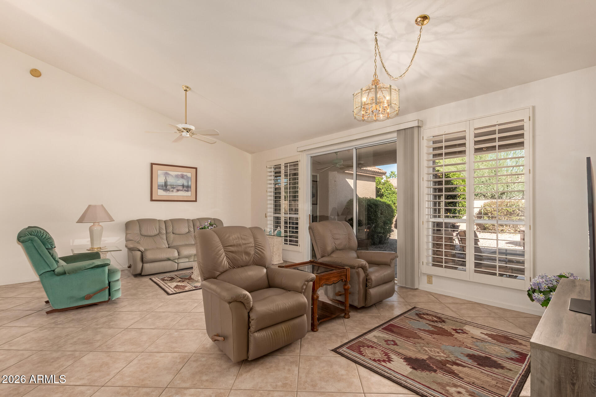 10904 East Spring Creek Road Sun Lakes, AZ 85248 - Photo 10 of 37 a living room with furniture and a window