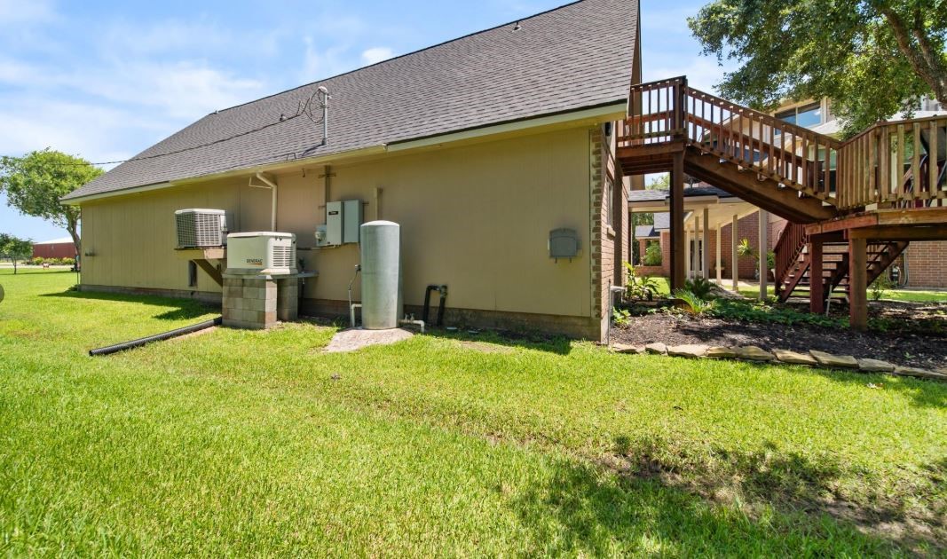 6714 Spray Lane, Unit C699A Rosharon, TX 77583 - Photo 44 of 48 Property features a 22k Generac GENERATOR with buried, dedicated 500 gallon Propane Tank. Water Well installed in 2020