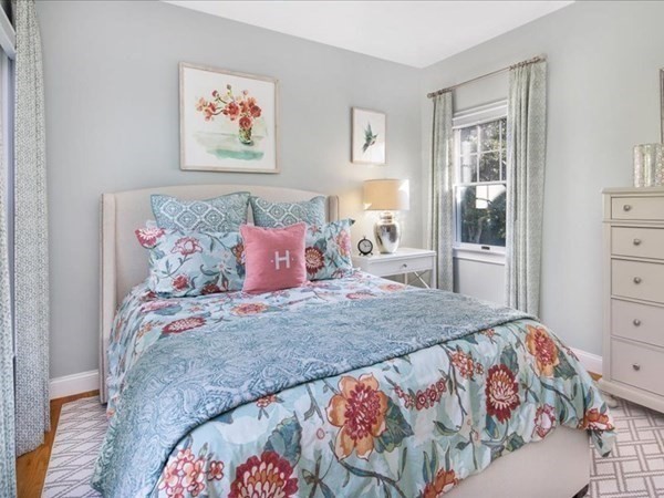 4 Sayles Road Hingham, MA 02043 - Photo 15 of 35 a bedroom with a bed and a dresser in it