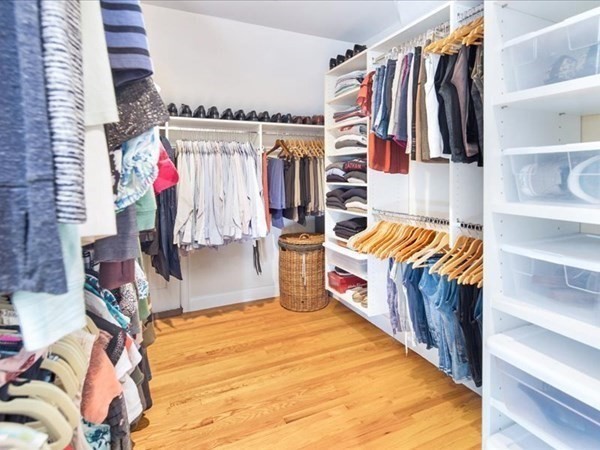 4 Sayles Road Hingham, MA 02043 - Photo 19 of 35 a view of walk in closet with clothes and shoes