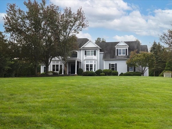 4 Sayles Road Hingham, MA 02043 - Photo 2 of 35 a front view of a house with a garden