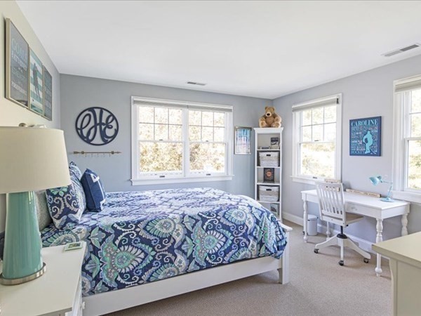 4 Sayles Road Hingham, MA 02043 - Photo 22 of 35 a bed room with a bed and a table