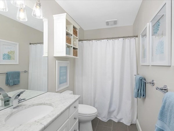 4 Sayles Road Hingham, MA 02043 - Photo 23 of 35 a bathroom with a granite countertop sink toilet and mirror