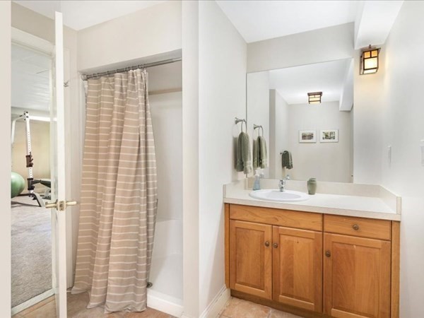 4 Sayles Road Hingham, MA 02043 - Photo 29 of 35 a bathroom with a granite countertop sink and a mirror
