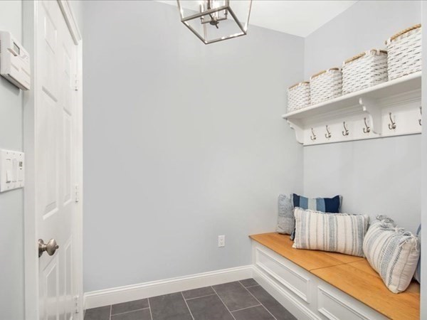 4 Sayles Road Hingham, MA 02043 - Photo 30 of 35 a bedroom with a bed and cabinets