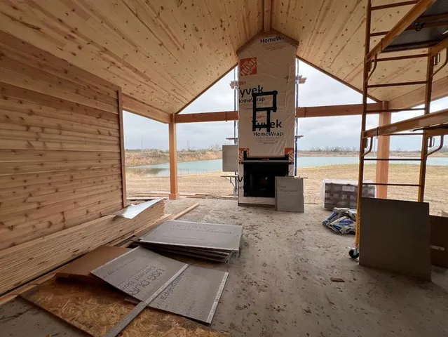 a view of a car park in front of house