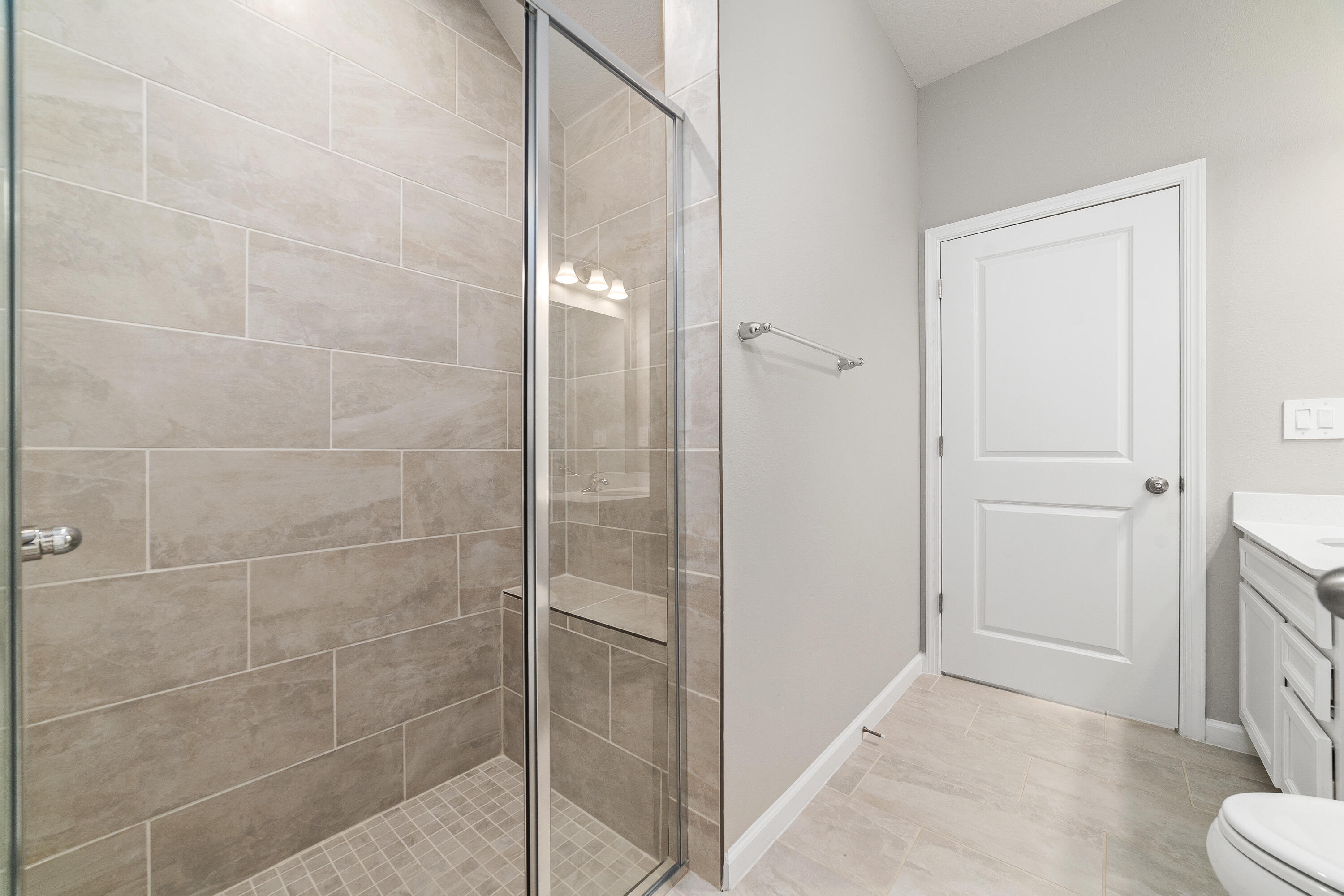 6555 Pomello Court Vero Beach, FL 32967 - Photo 15 of 35 a bathroom with a shower and toilet