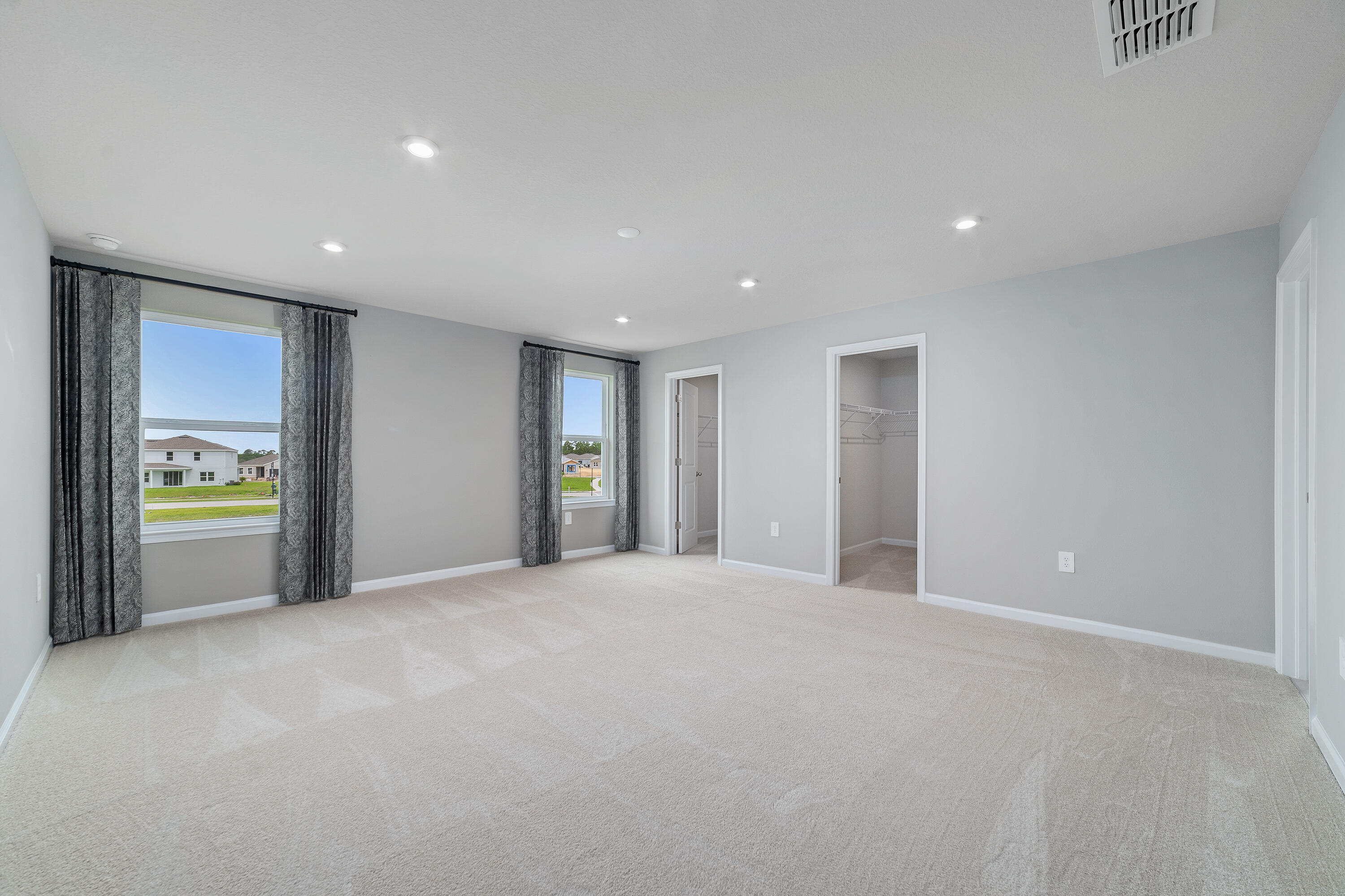 6555 Pomello Court Vero Beach, FL 32967 - Photo 18 of 35 a view of an empty room with a window