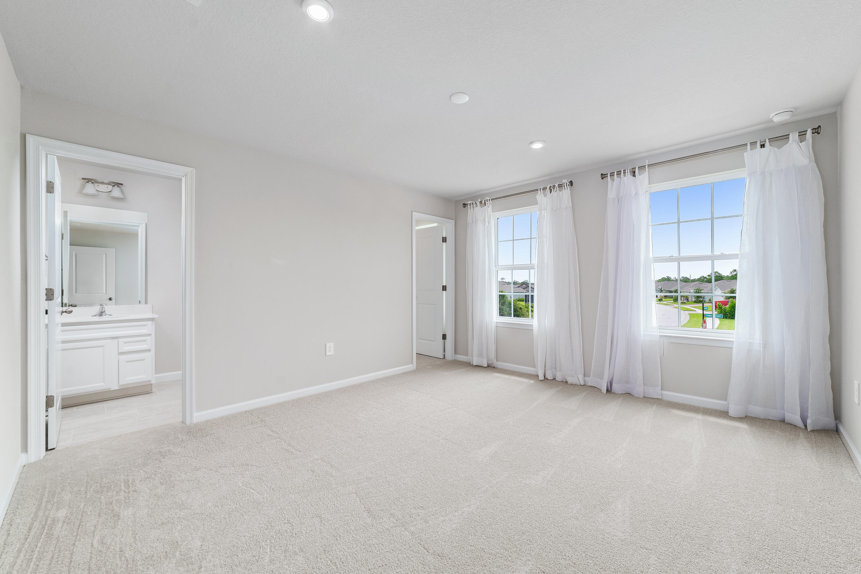 6555 Pomello Court Vero Beach, FL 32967 - Photo 20 of 35 a view of an empty room with a window