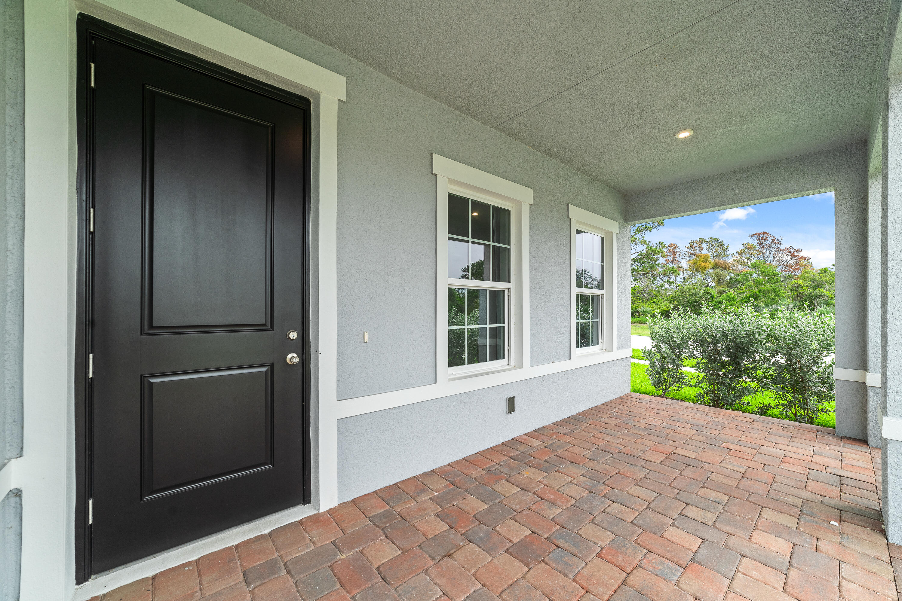 6555 Pomello Court Vero Beach, FL 32967 - Photo 2 of 35 a view of entrance gate of a house