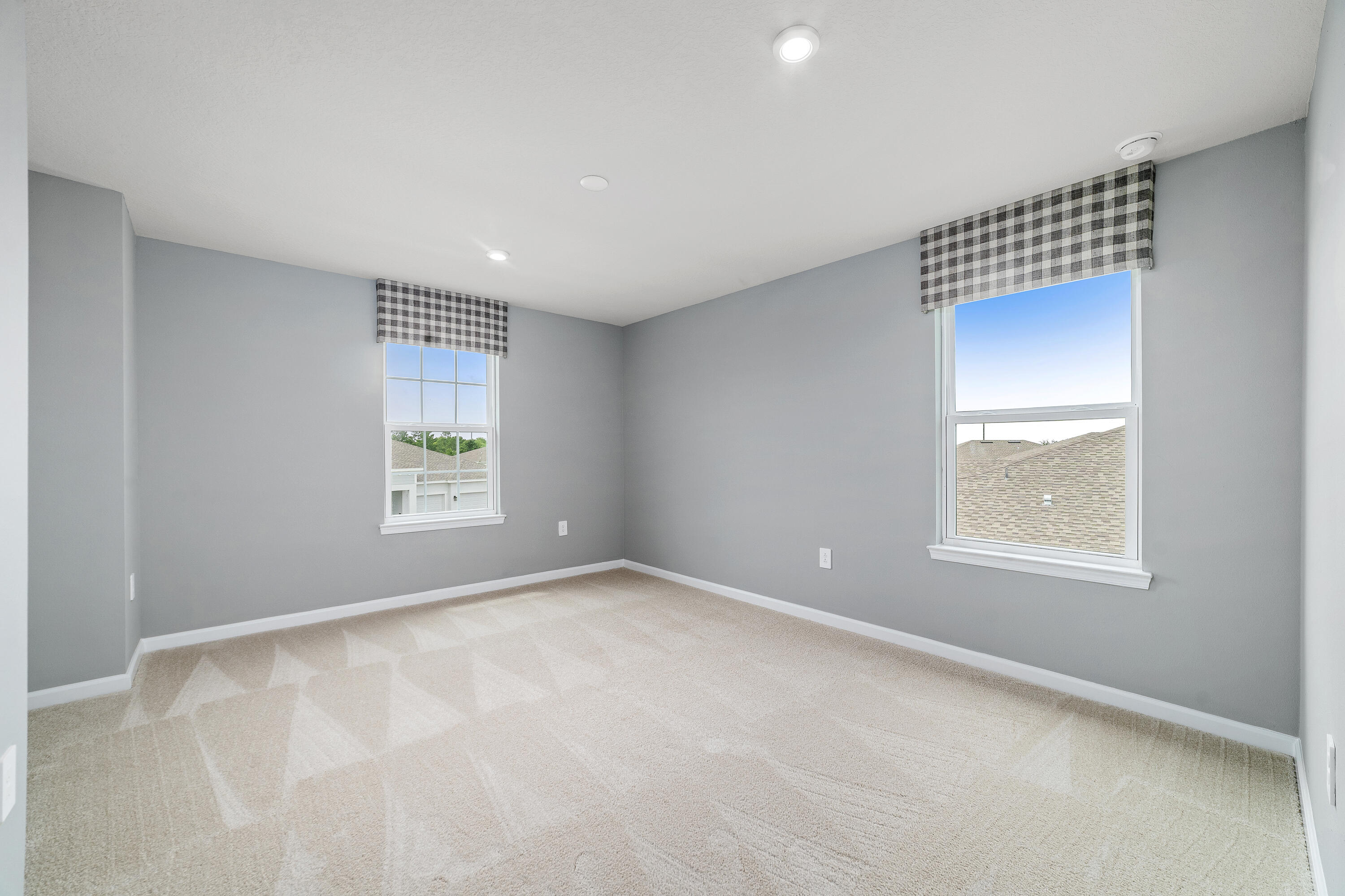 6555 Pomello Court Vero Beach, FL 32967 - Photo 21 of 35 a view of an empty room with a window