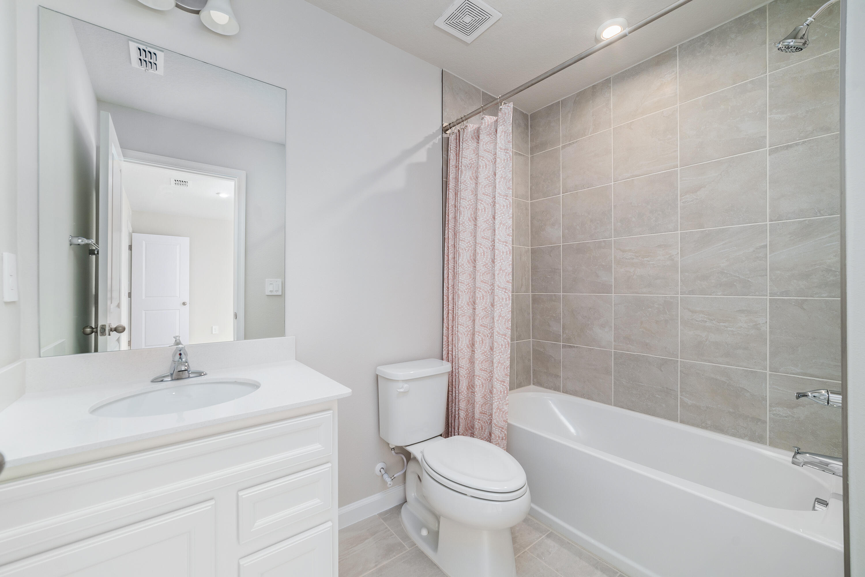 6555 Pomello Court Vero Beach, FL 32967 - Photo 24 of 35 a bathroom with a sink toilet and shower