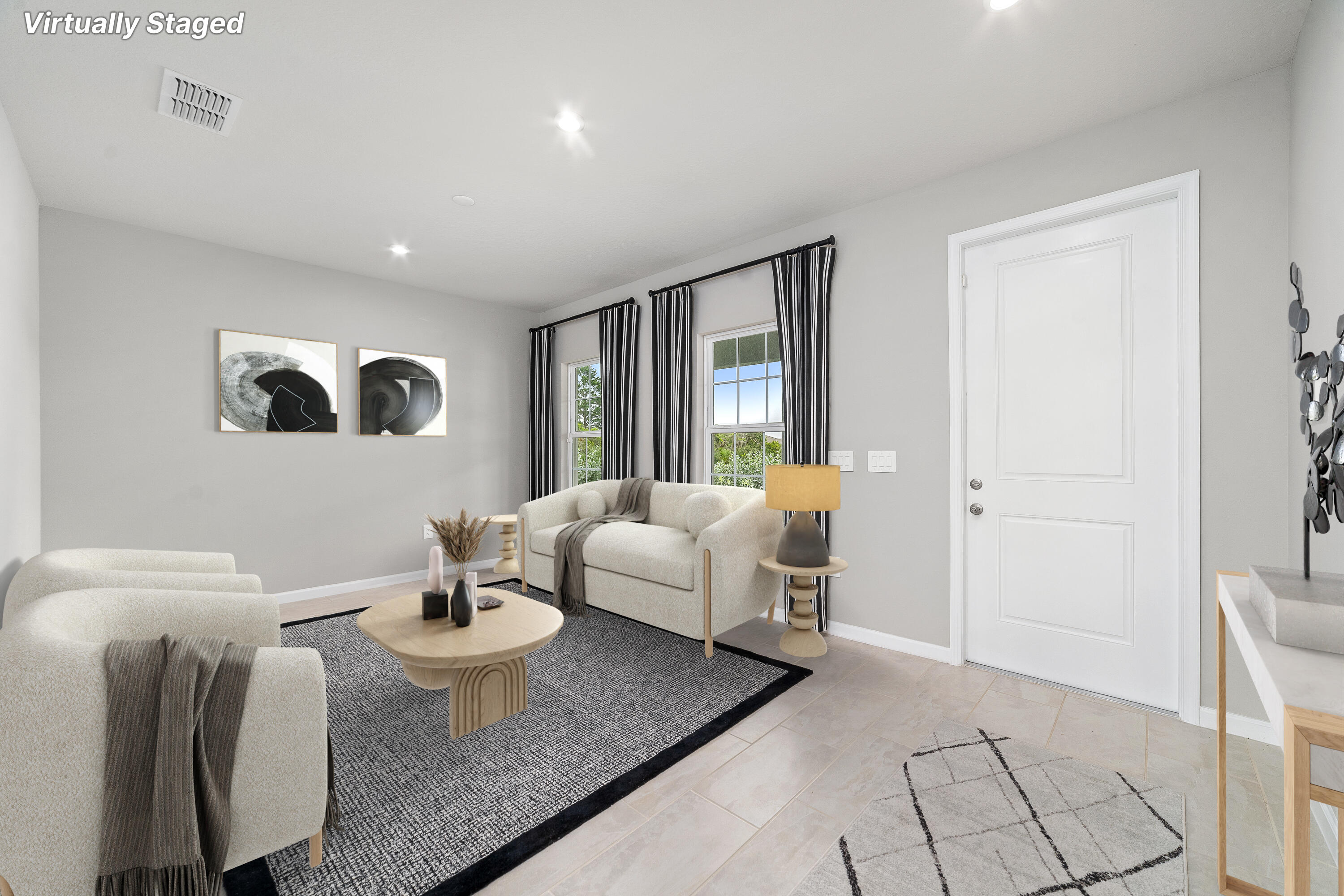 6555 Pomello Court Vero Beach, FL 32967 - Photo 3 of 35 a living room with furniture and wooden floor