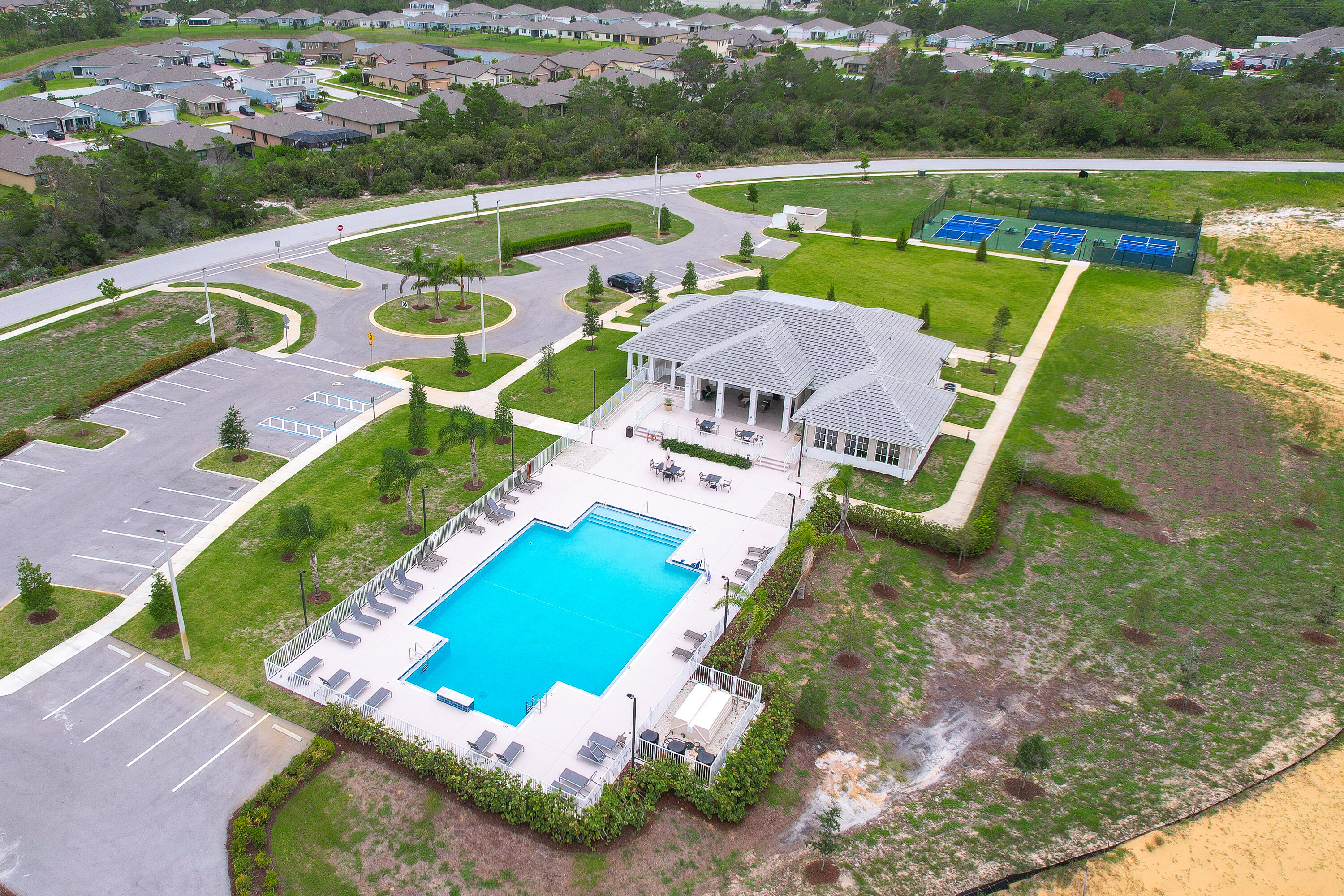 6555 Pomello Court Vero Beach, FL 32967 - Photo 35 of 35 an aerial view of a house with a big yard