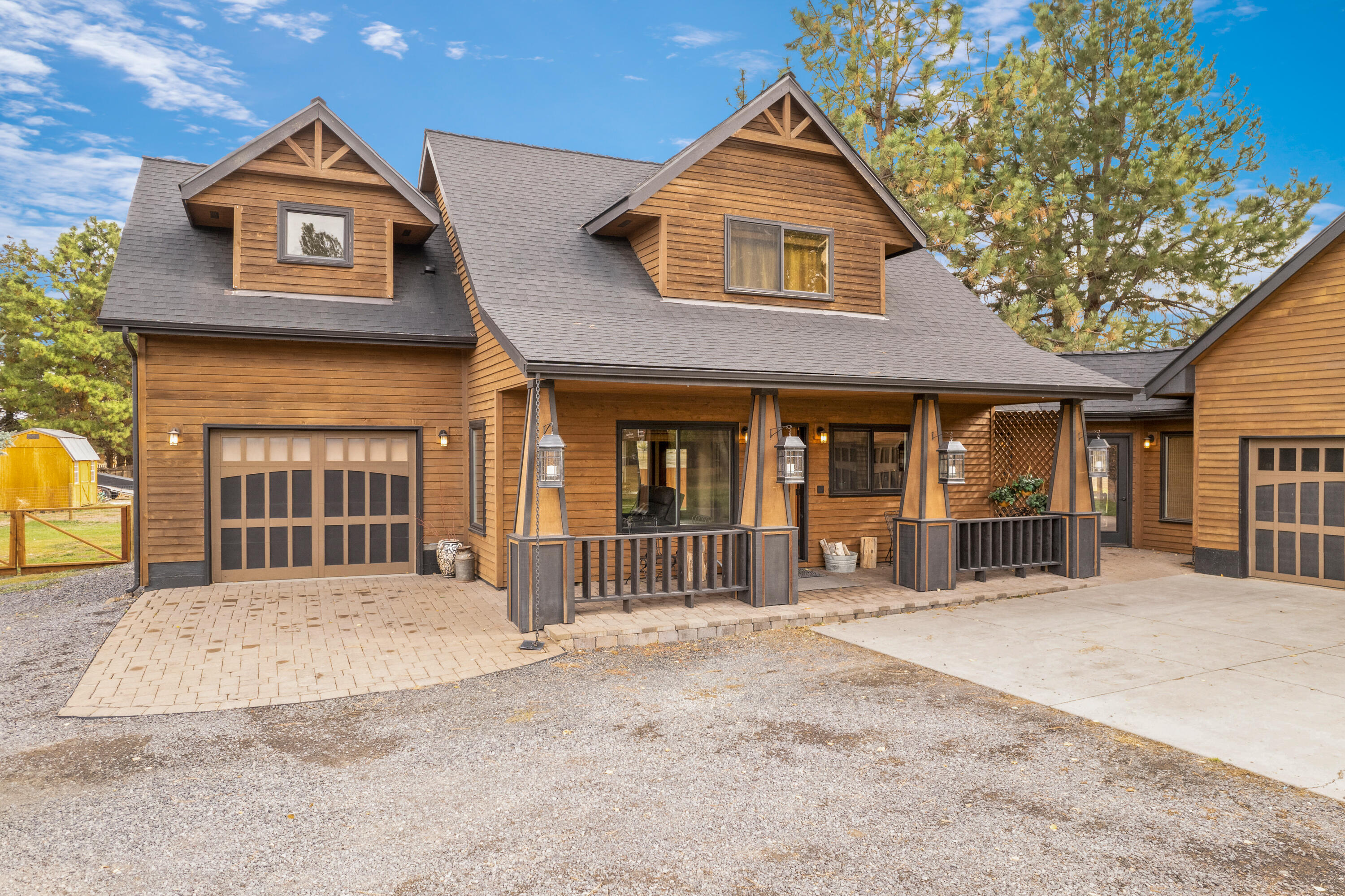 63520 Cricketwood Road Bend, OR 97701 - Photo 47 of 84 a front view of a house with a yard