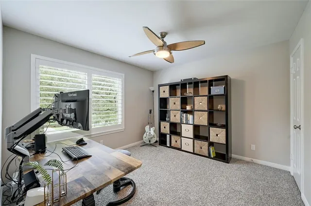 a bedroom with furniture and a window