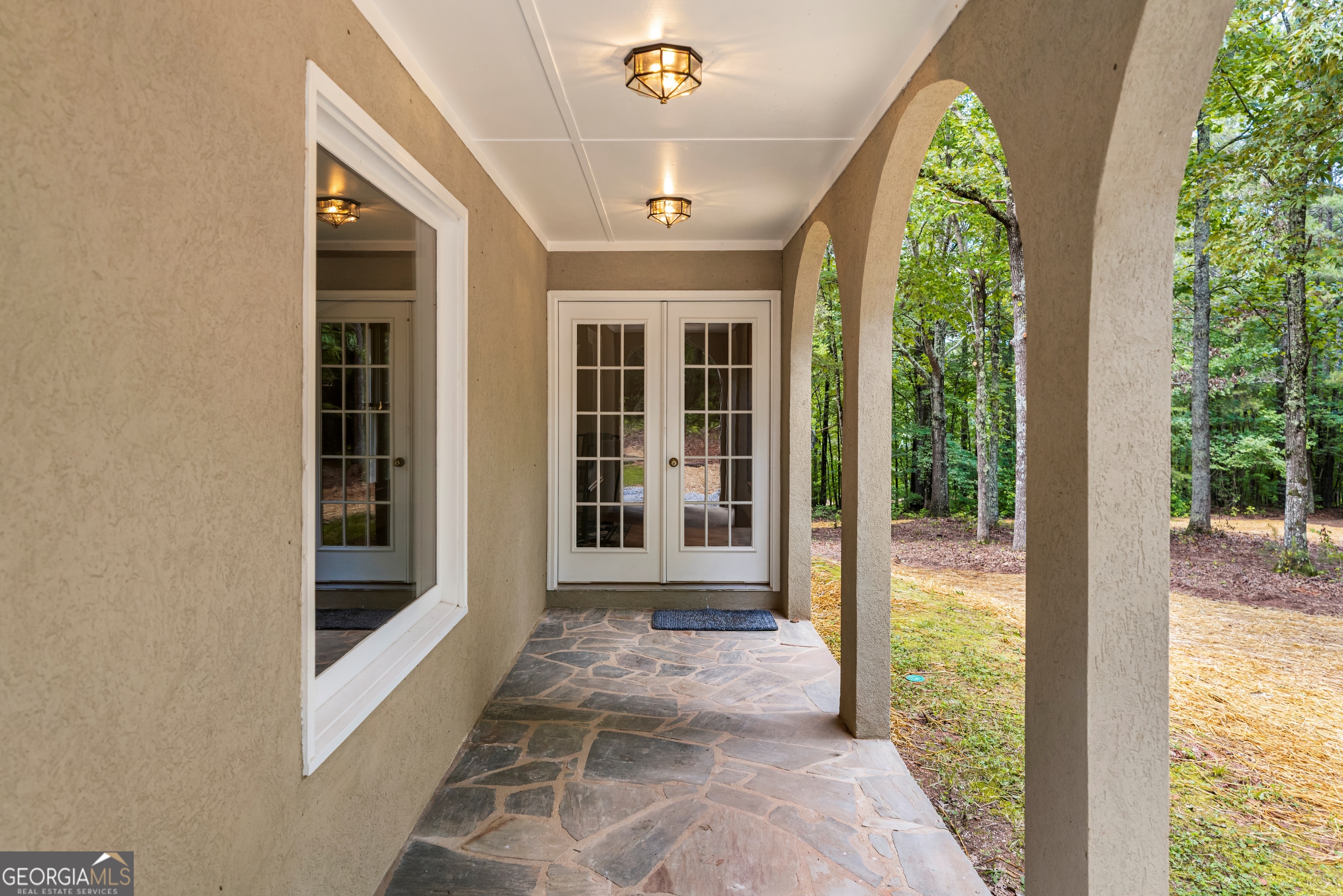 1933 Highway 101 Dallas, GA 30157 - Photo 14 of 40 Main Level Terrace to French Doors in Dining Room