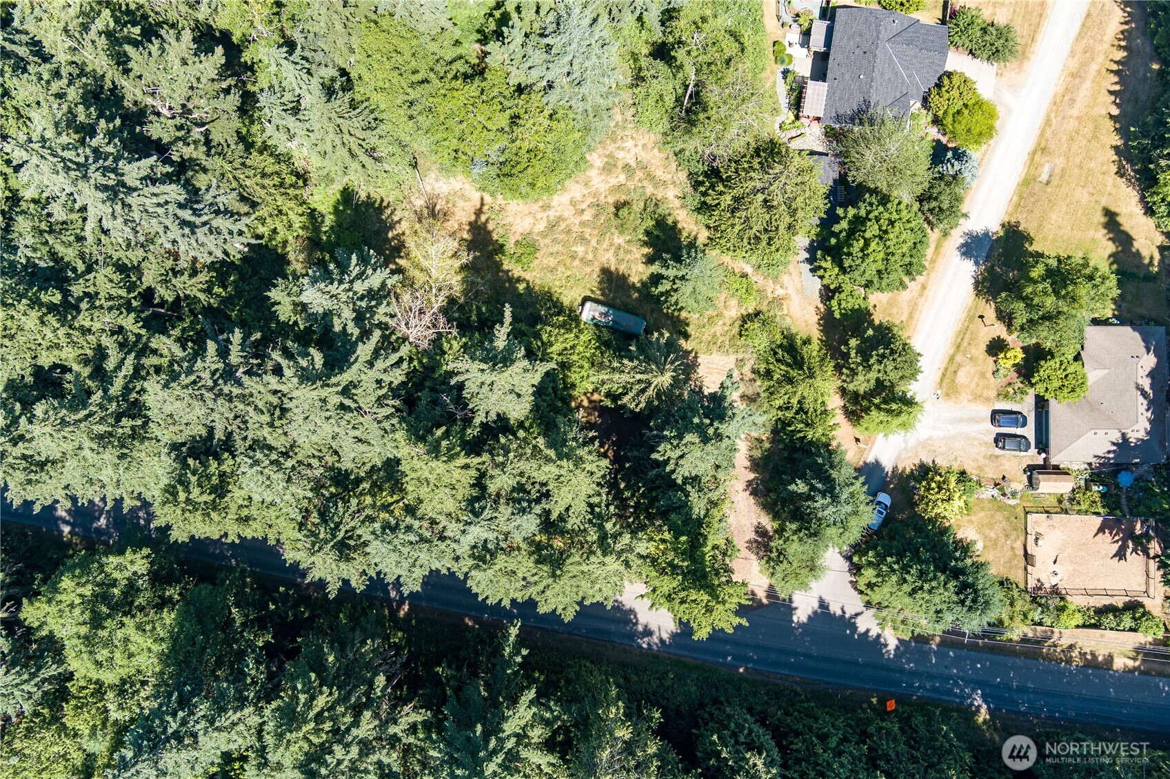 -xxx Sandy Point Road Langley, WA 98260 - Photo 10 of 17 an aerial view of a houses with yard