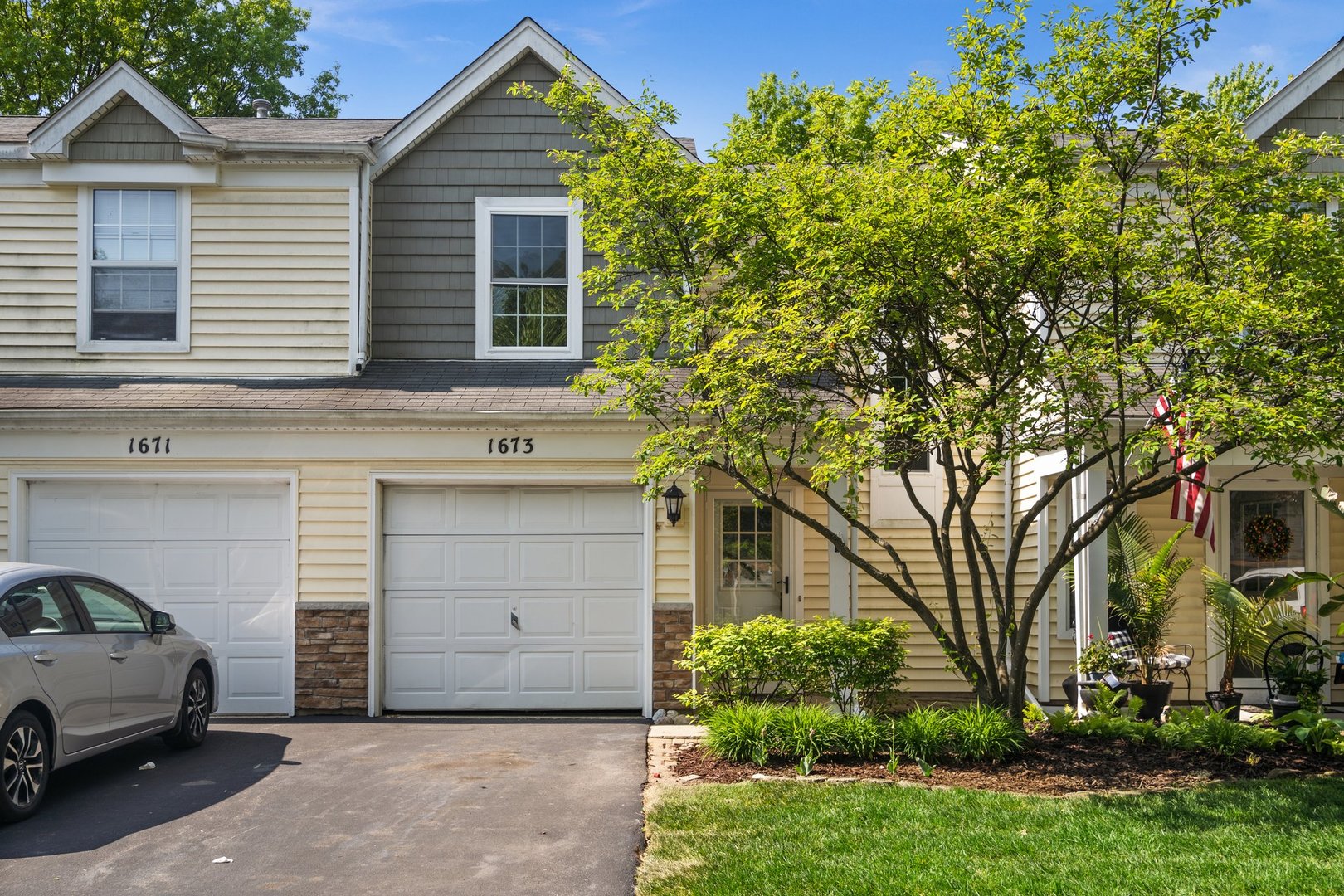 a house view with a garden space