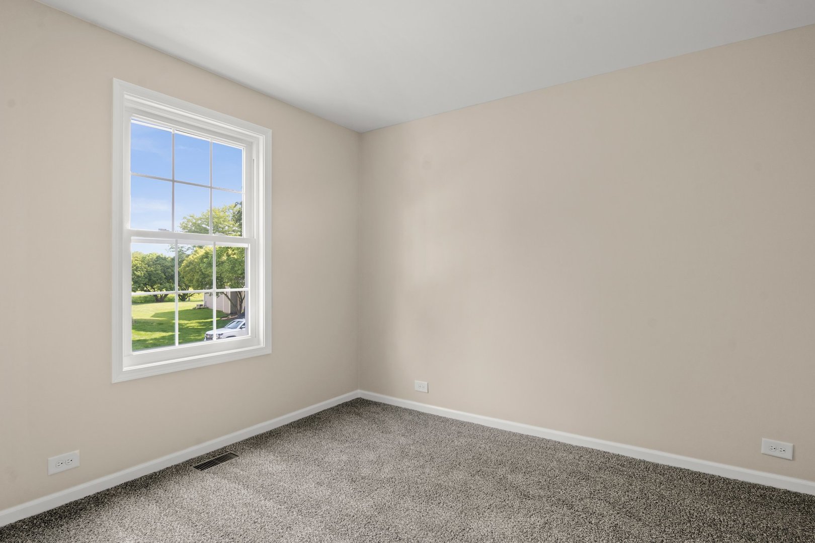 1673 Pebble Beach Circle Elgin, IL 60123 - Photo 14 of 25 an empty room with a window