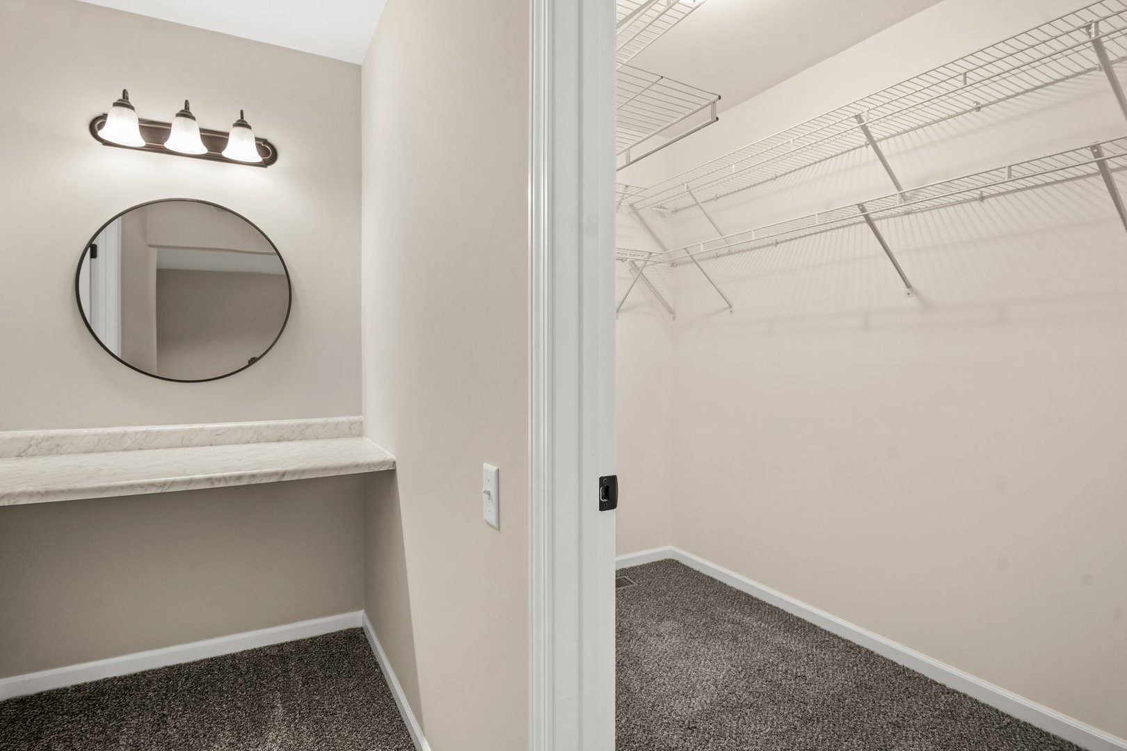 1673 Pebble Beach Circle Elgin, IL 60123 - Photo 18 of 25 a bathroom with a sink and a mirror