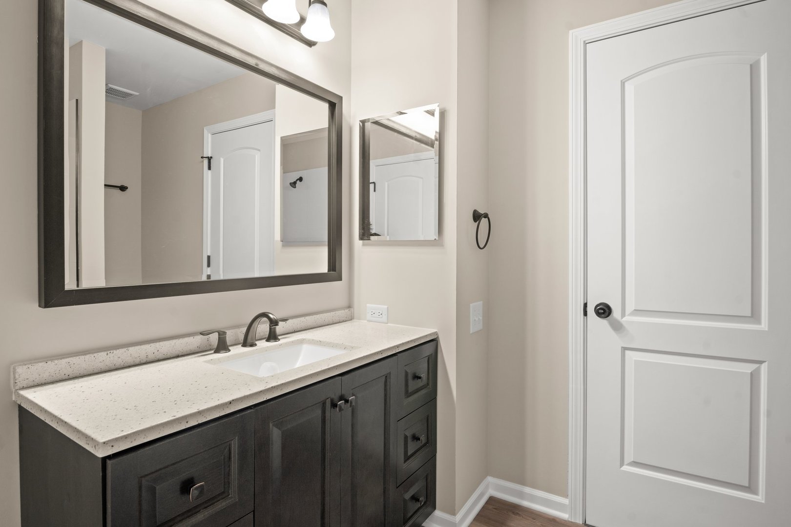 1673 Pebble Beach Circle Elgin, IL 60123 - Photo 19 of 25 a bathroom with a sink vanity and a mirror