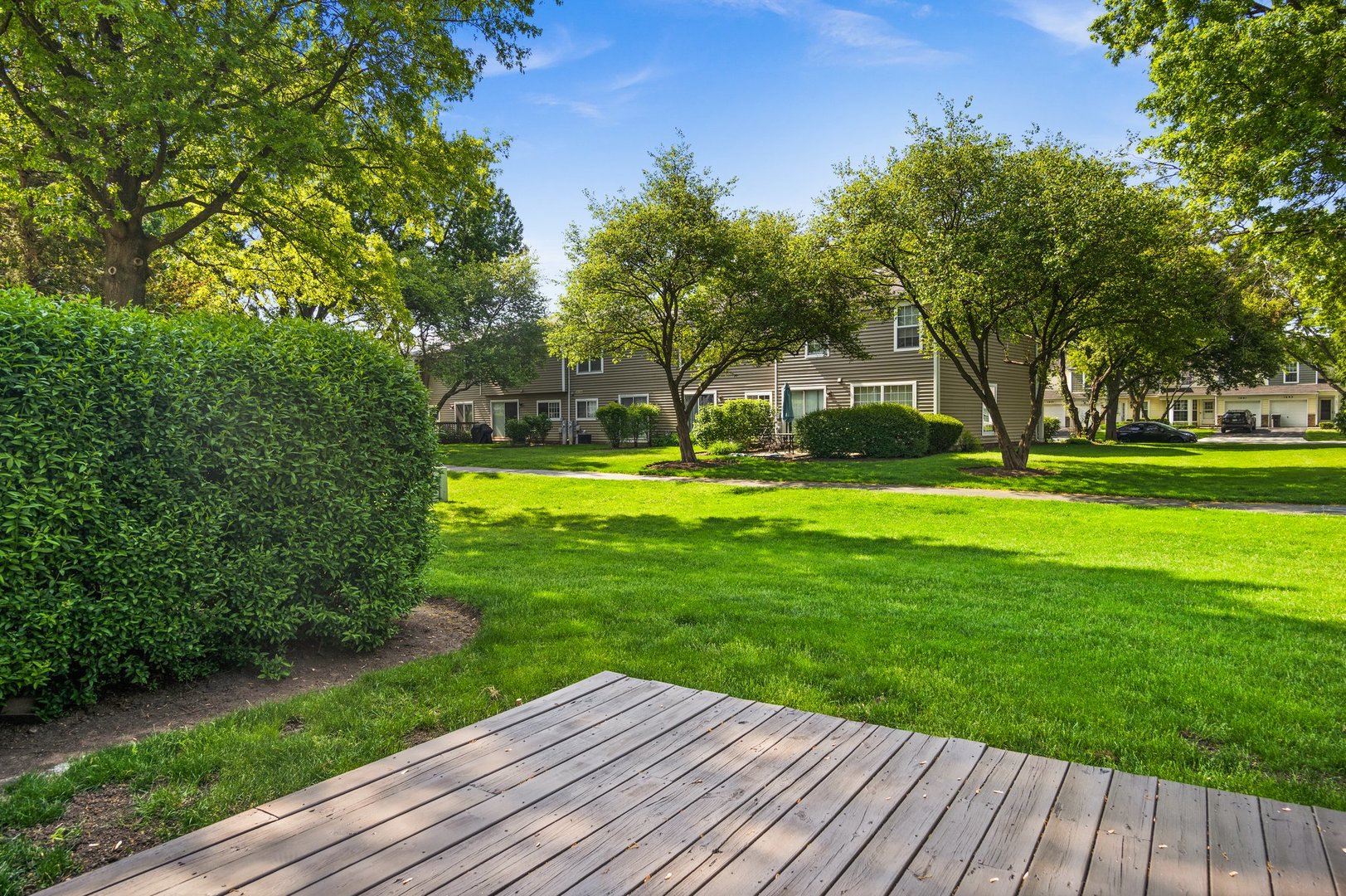 1673 Pebble Beach Circle Elgin, IL 60123 - Photo 22 of 25 a view of a house with a yard