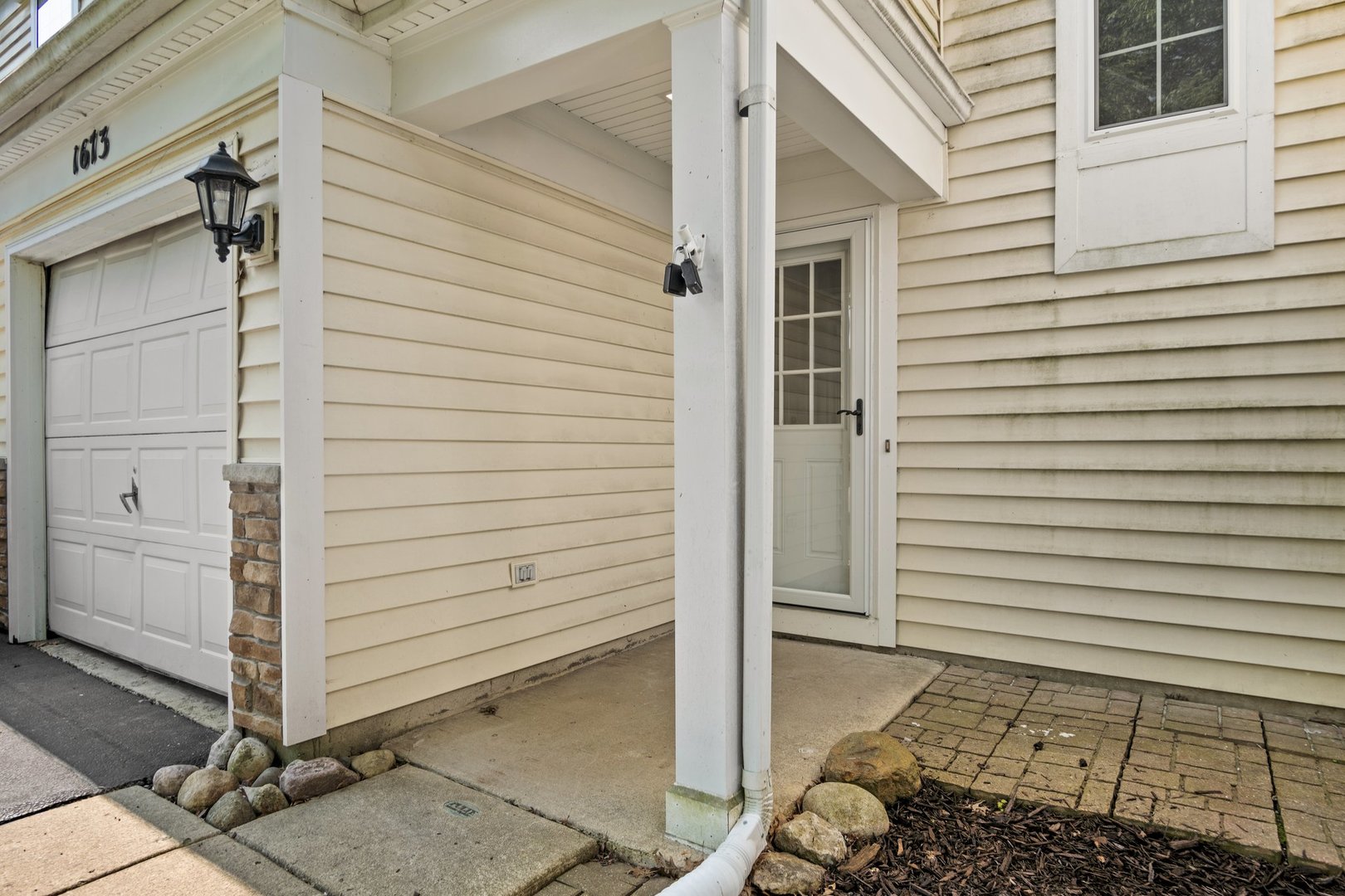 1673 Pebble Beach Circle Elgin, IL 60123 - Photo 3 of 25 a view of a wooden door