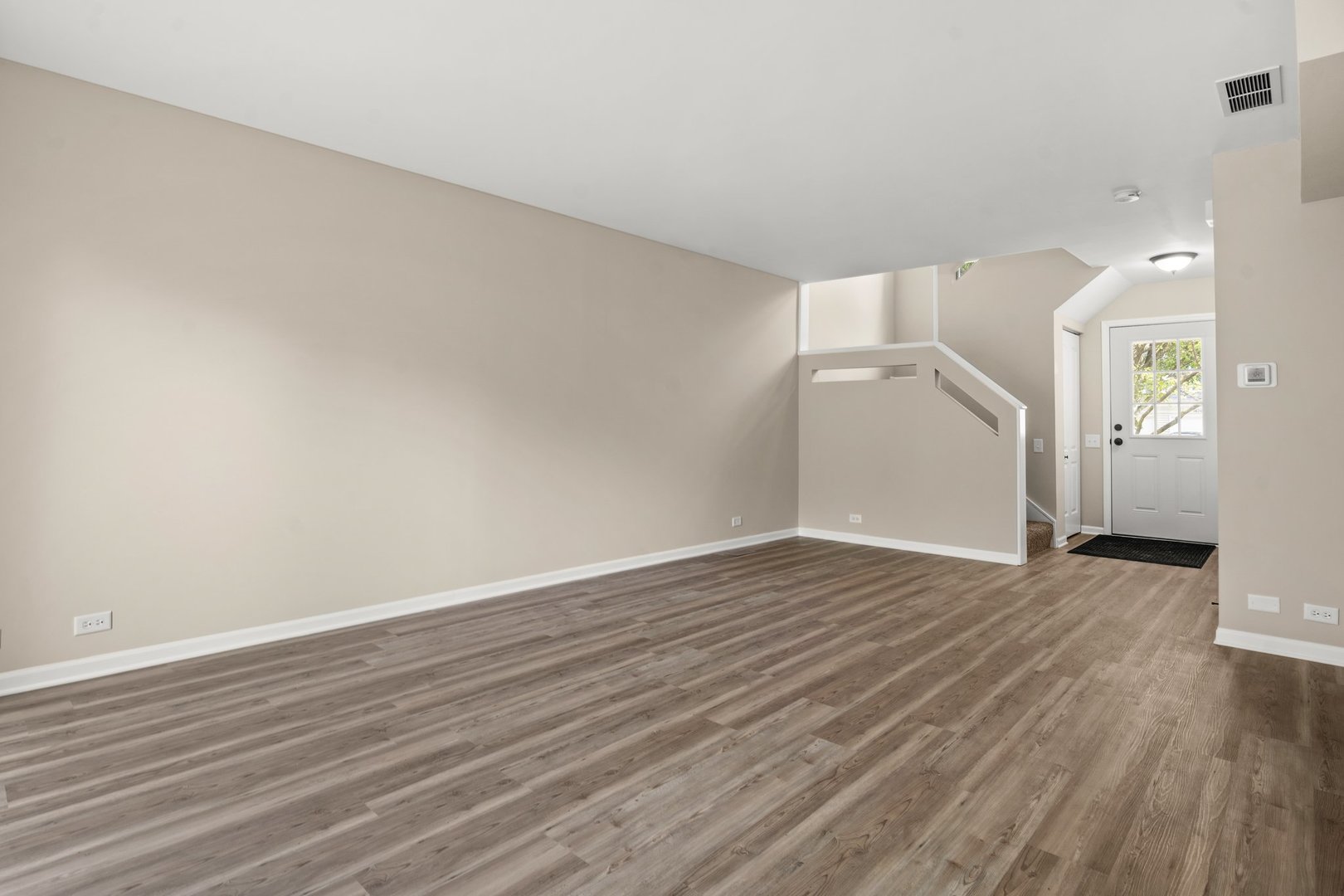 1673 Pebble Beach Circle Elgin, IL 60123 - Photo 7 of 25 wooden floor in an empty room