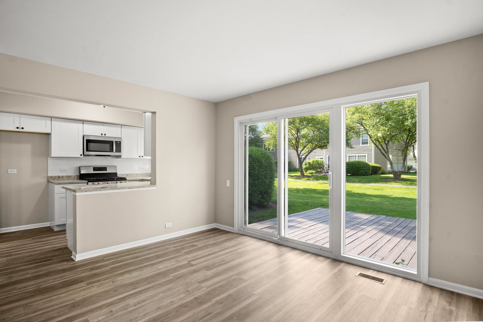 1673 Pebble Beach Circle Elgin, IL 60123 - Photo 8 of 25 a view of kitchen with wooden floor and electronic appliances