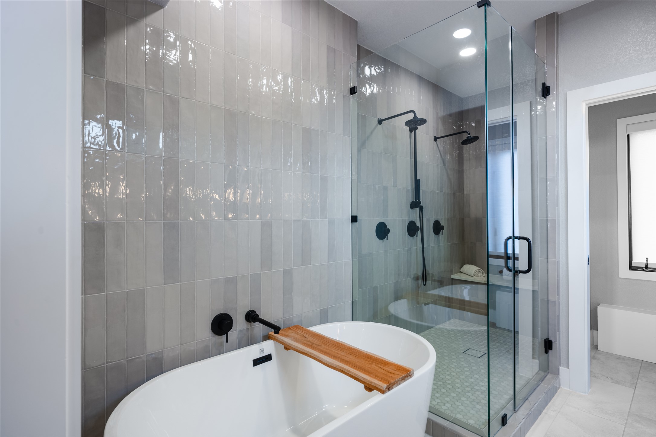516 Deckhouse Drive Point Venture, TX 78645 - Photo 15 of 36 a bathroom with a tub and shower