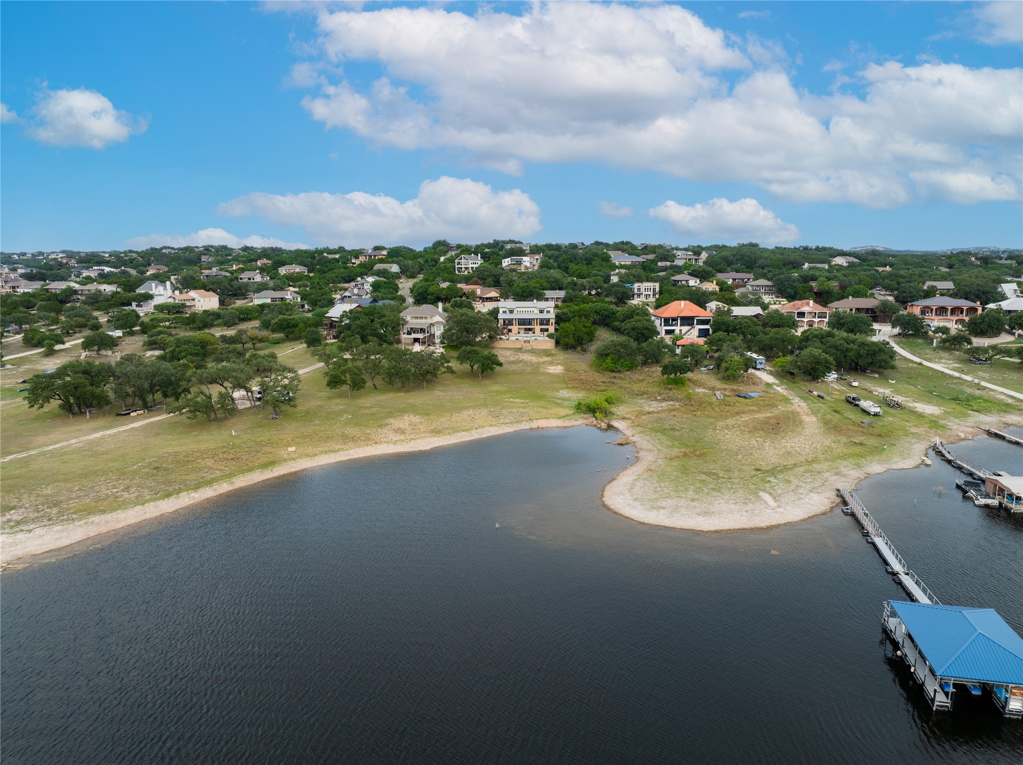 516 Deckhouse Drive Point Venture, TX 78645 - Photo 36 of 36 a view of a lake with a city