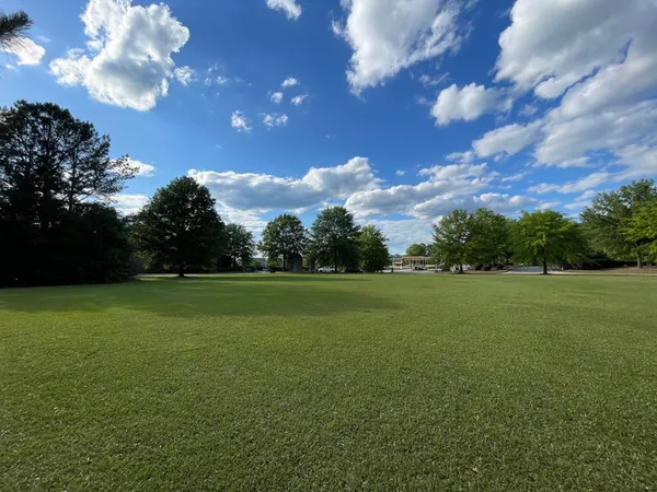 a view of a field with clear sky