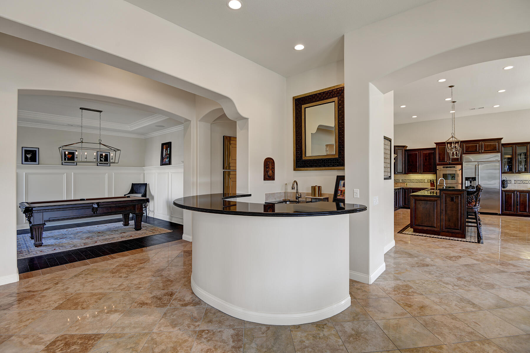 81103 Monarchos Circle La Quinta, CA 92253 - Photo 12 of 34 WET BAR TO BILLIARDS ROOM AND KITCHEN RS