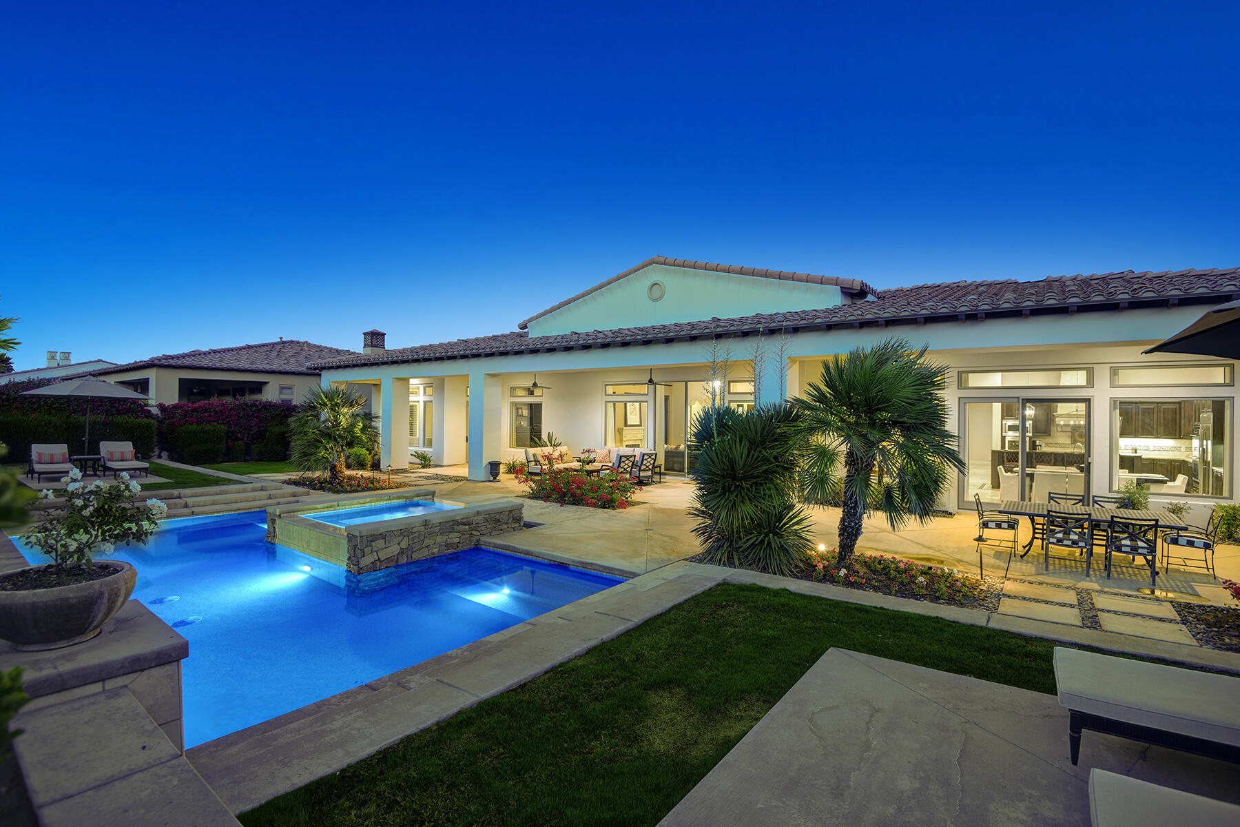 81103 Monarchos Circle La Quinta, CA 92253 - Photo 30 of 34 CHAISE LANDING TO POOL AND HOUSE NIGHT R