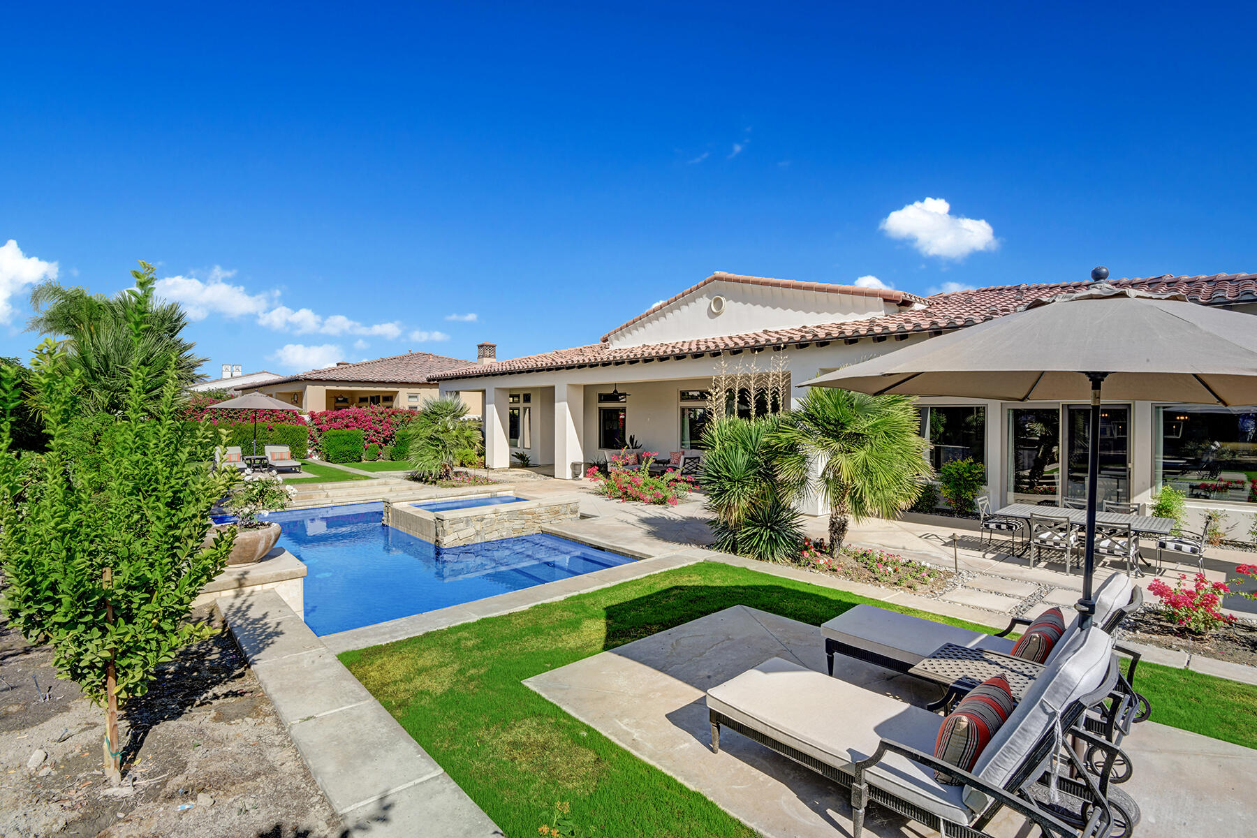 81103 Monarchos Circle La Quinta, CA 92253 - Photo 31 of 34 CHAISE LANDING TO POOL SPA AND HOUSE RS