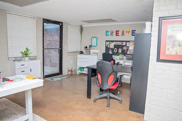 a workspace with furniture