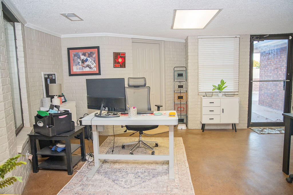 2917 Quail Ridge Road Denver City, TX 79323 - Photo 35 of 55 a workspace with furniture
