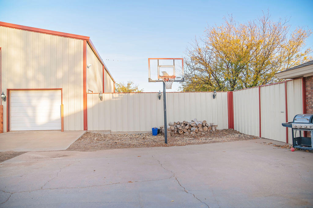 2917 Quail Ridge Road Denver City, TX 79323 - Photo 41 of 55 a view of entrance gate of a house