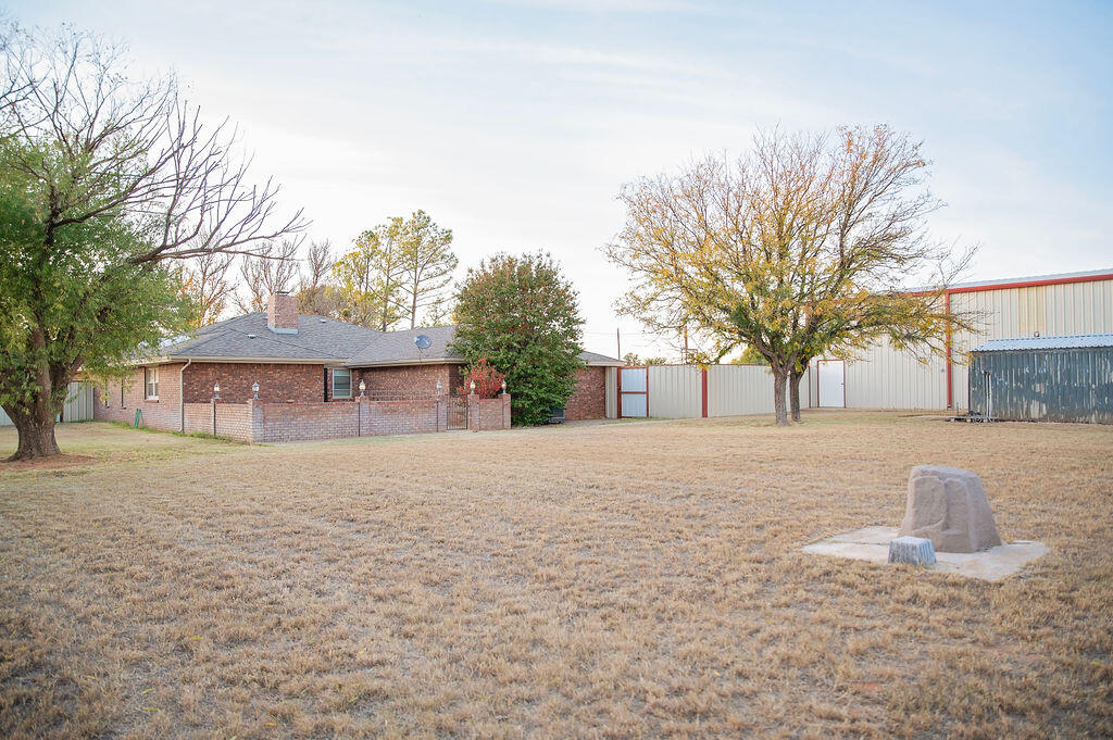 2917 Quail Ridge Road Denver City, TX 79323 - Photo 53 of 55 a front view of a house with a yard and garage
