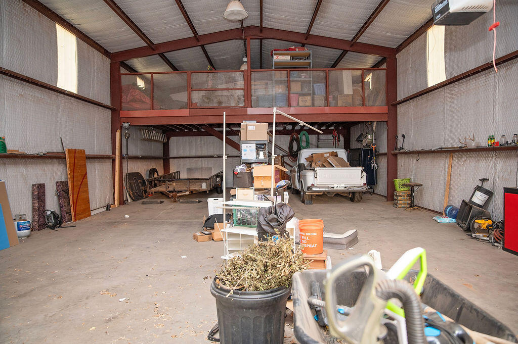 2917 Quail Ridge Road Denver City, TX 79323 - Photo 54 of 55 a view of a patio with table and chairs