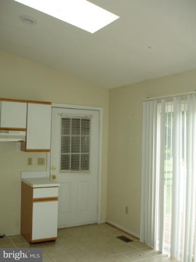 2310 Orange Road Culpeper, VA 22701 - Photo 3 of 6 Skylight in kitchen & sliding glass door to deck