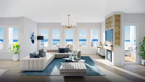 a living room with furniture and a chandelier