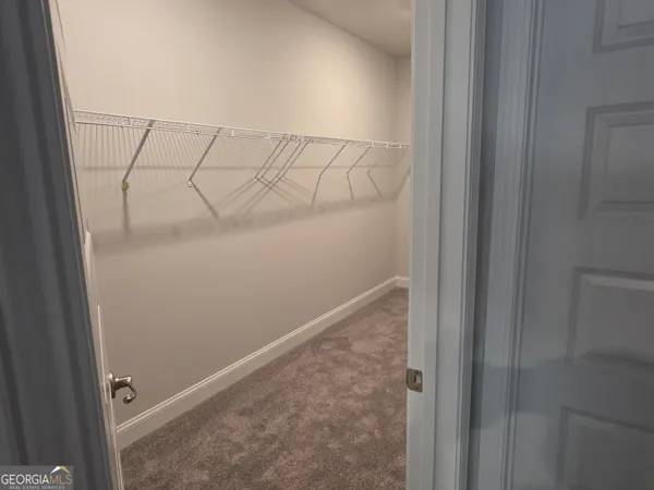 an empty room with closet