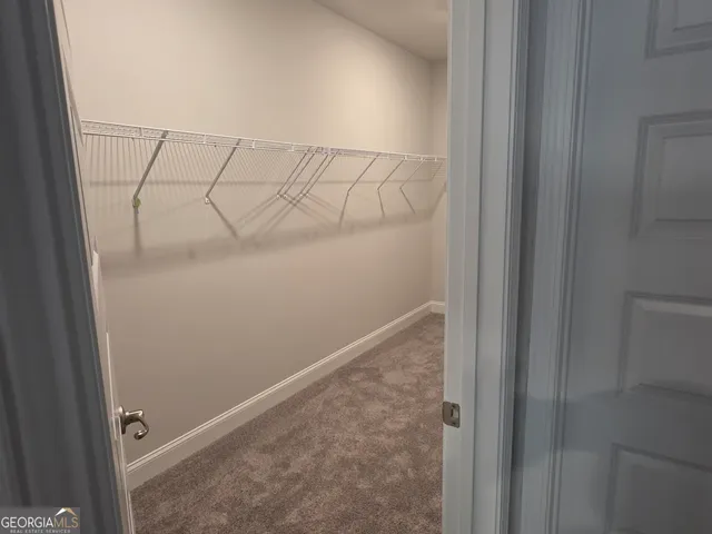 an empty room with closet