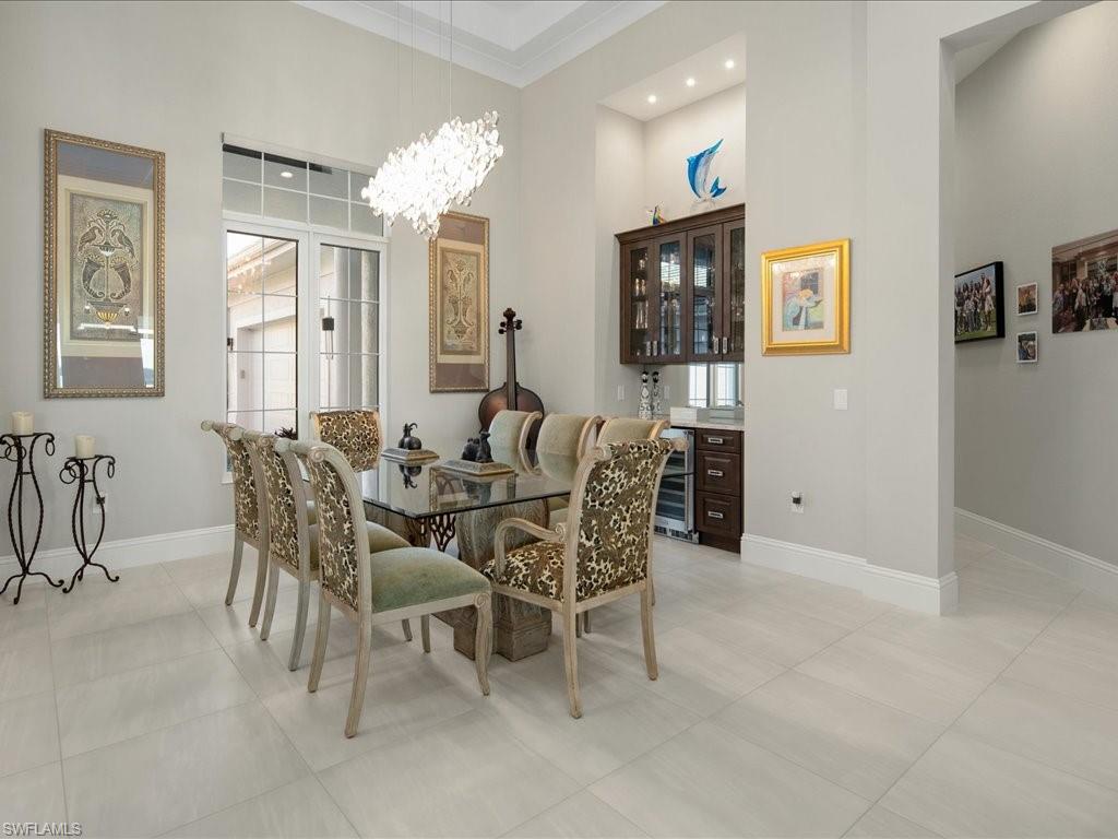 18460 Blue Eye Loop Fort Myers, FL 33913 - Photo 12 of 50 a view of a dining room with furniture