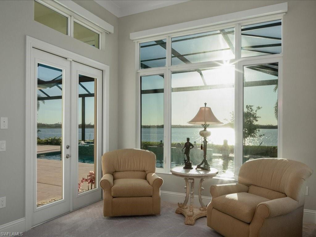 18460 Blue Eye Loop Fort Myers, FL 33913 - Photo 15 of 50 a living room with furniture and a large window